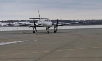 132d Wing celebrates legacy of RC-26 program with final flight